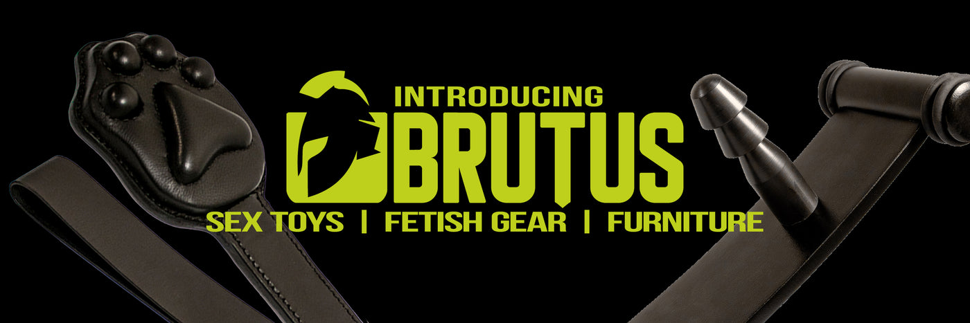 Promotional graphic for the Brutus brand, featuring a black leather strap with a black paw-print pad on the left and a black cylindrical component on the right, set against a black background with bright yellow text reading 'INTRODUCING BRUTUS SEX TOYS | FETISH GEAR | FURNITURE'.