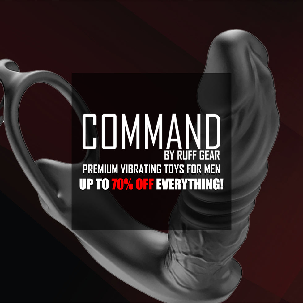 A promotional graphic for a ruff gear adult toy, showing a grayscale close-up of a curved, textured vibrator with a loop handle on the left. A large black semi-transparent box in the center contains the text 'COMMAND BY RUFF GEAR PREMIUM VIBRATING TOYS FOR MEN UP TO 70% OFF EVERYTHING!'.