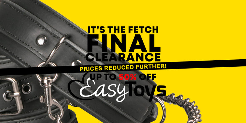 Promotional banner for Easy Toys featuring a close-up of a black leather dog harness with metal rings and clips against a bright yellow background, with text reading 'IT'S THE FETCH FINAL CLEARANCE PRICES REDUCED FURTHER! UP TO 50% OFF Easy Toys'.