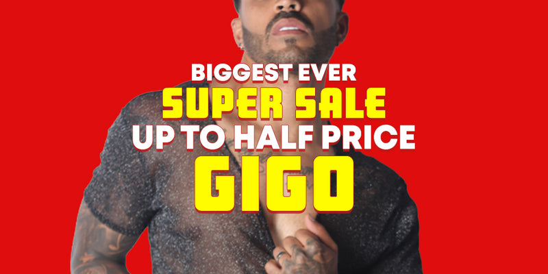A promotional banner featuring a man against a solid red background with large yellow and white text reading 'BIGGEST EVER SUPER SALE UP TO HALF PRICE GIGO'.