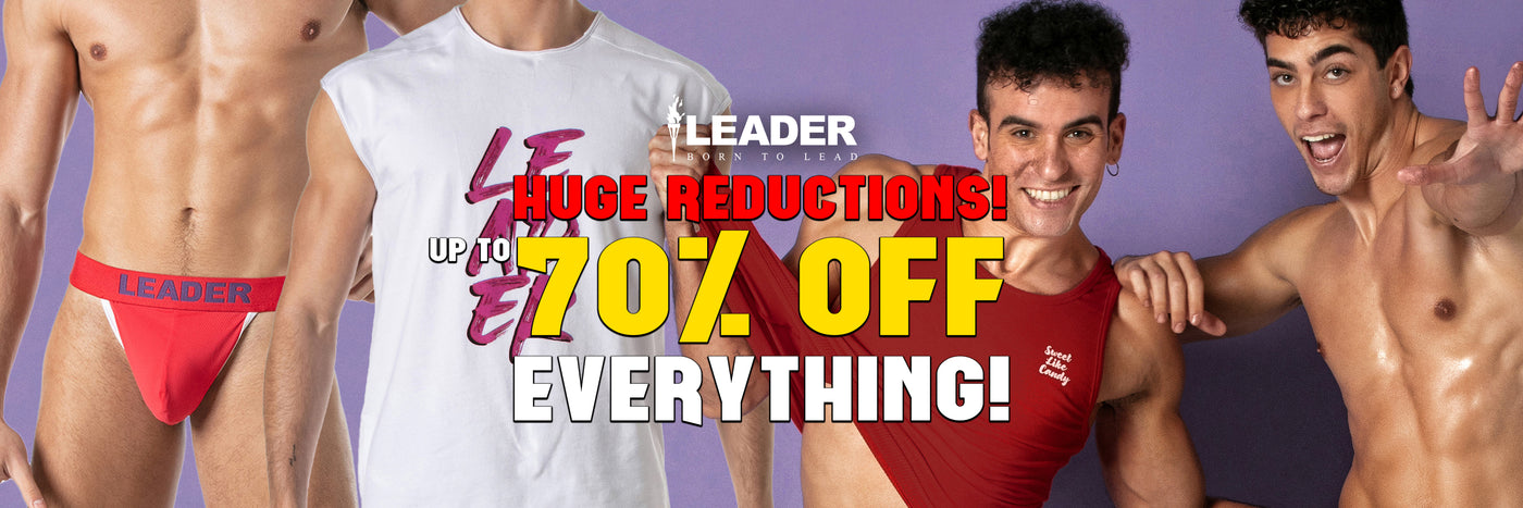 Promotional banner featuring multiple male models wearing LEADER branded underwear and a sleeveless white T-shirt, with large sale text reading 'LEADER HUGE REDUCTIONS! UP TO 70% OFF EVERYTHING!' on a purple background.