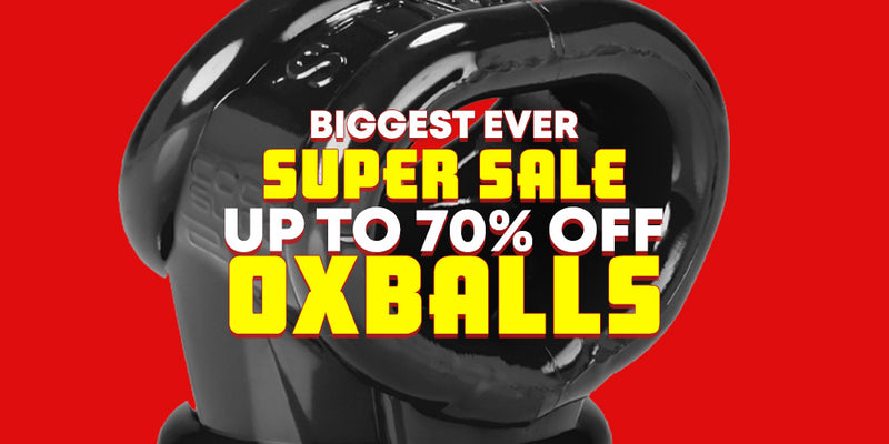 A glossy black OXBALLS product shown against a bright red background with large promotional text reading 'BIGGEST EVER SUPER SALE UP TO 70% OFF OXBALLS' in white and yellow.