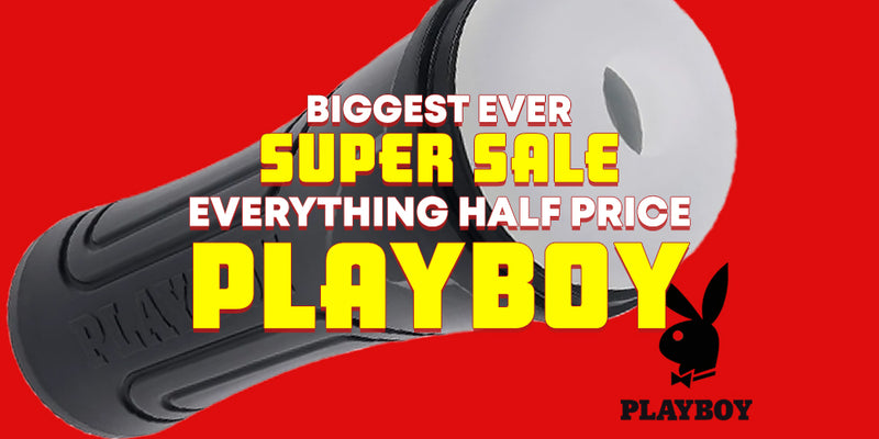 Promotional graphic for a Playboy-branded product on a bright red background, featuring a large black-and-white cylindrical item with bold text reading 'BIGGEST EVER SUPER SALE EVERYTHING HALF PRICE PLAYBOY' and the Playboy bunny logo.