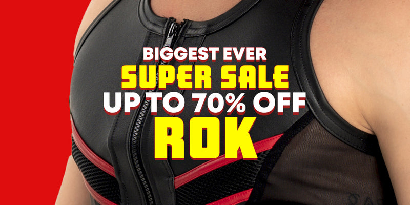 Close-up of a person wearing a black athletic vest or bodysuit with red trim and a front zipper, overlaid with large promotional text reading 'BIGGEST EVER SUPER SALE UP TO 70% OFF ROK' on a red background.