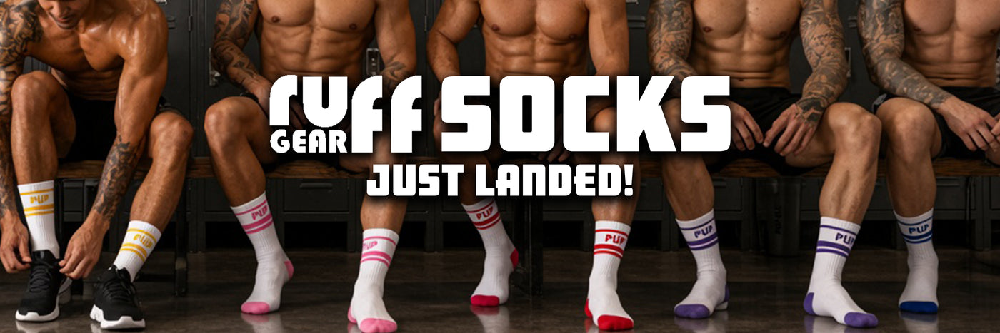 A promotional banner showing multiple cropped male models seated on a bench, wearing white crew socks with colorful stripes and text overlays reading 'RUFF SOCKS GEAR JUST LANDED!'.