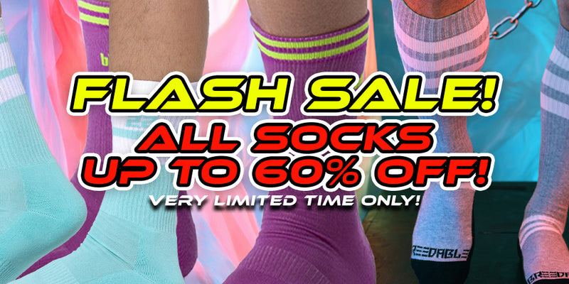 Promotional sale graphic showing multiple pairs of athletic socks worn on legs, with large text reading 'FLASH SALE! ALL SOCKS UP TO 60% OFF! VERY LIMITED TIME ONLY!'. Visible sock branding includes 'ESPRIT' on a black toe area.
