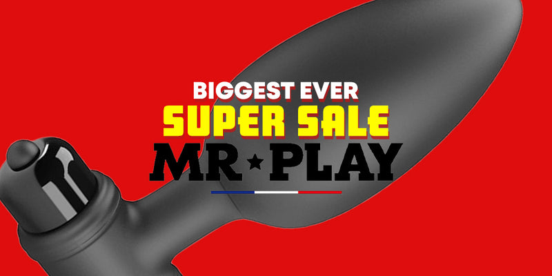 Promotional graphic for a 'BIGGEST EVER SUPER SALE MR PLAY' sale event, featuring a close-up of a black bicycle handlebar on a vibrant red background with bold yellow and white text.