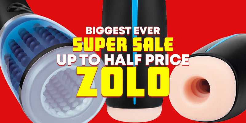 Promotional graphic for Zolo adult toys featuring a black and blue cylindrical massager with a transparent outer shell showing internal blue massage nodes, alongside close-ups of the black and peach-colored inner sleeve. Large yellow and white text reads 'BIGGEST EVER SUPER SALE UP TO HALF PRICE ZOLO' on a solid red background.